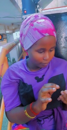 Tasha, 22, Uganda