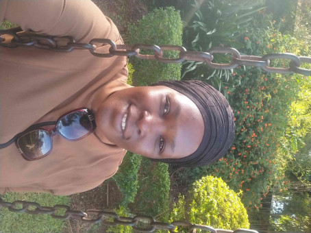 Shidah, 41, Uganda