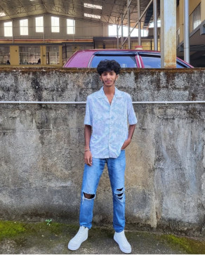 Tomy, 21, India