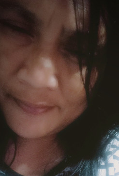 NERIE CASTANtildeE, 52, Philippines