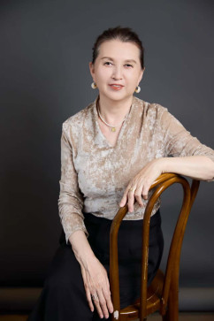 WangQian, 56, China